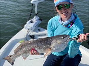 First mate with a redfish